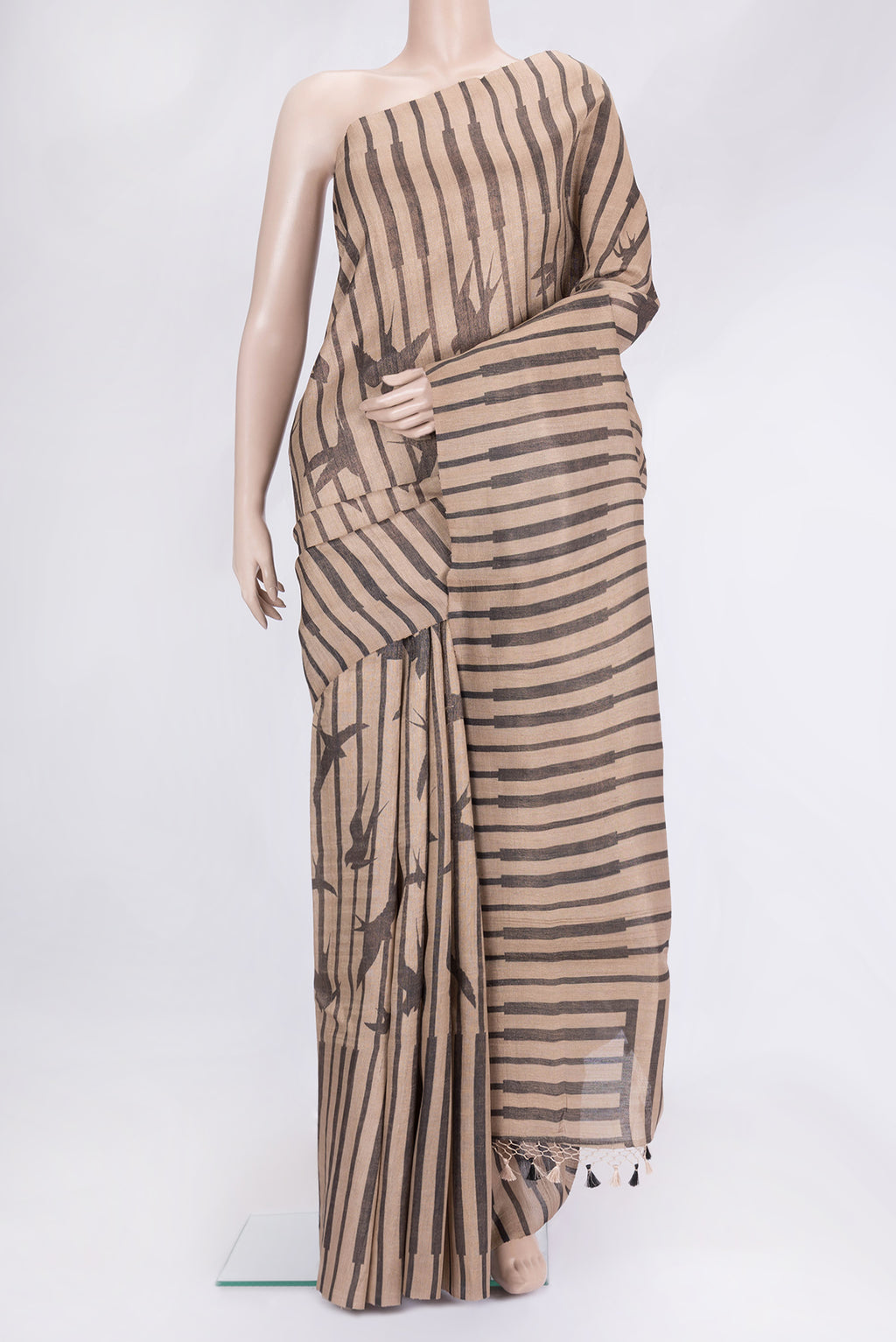 Brown Dual Tone Tussar Silk Saree with Stripes on the body and Without Border.  displayed on a mannequin