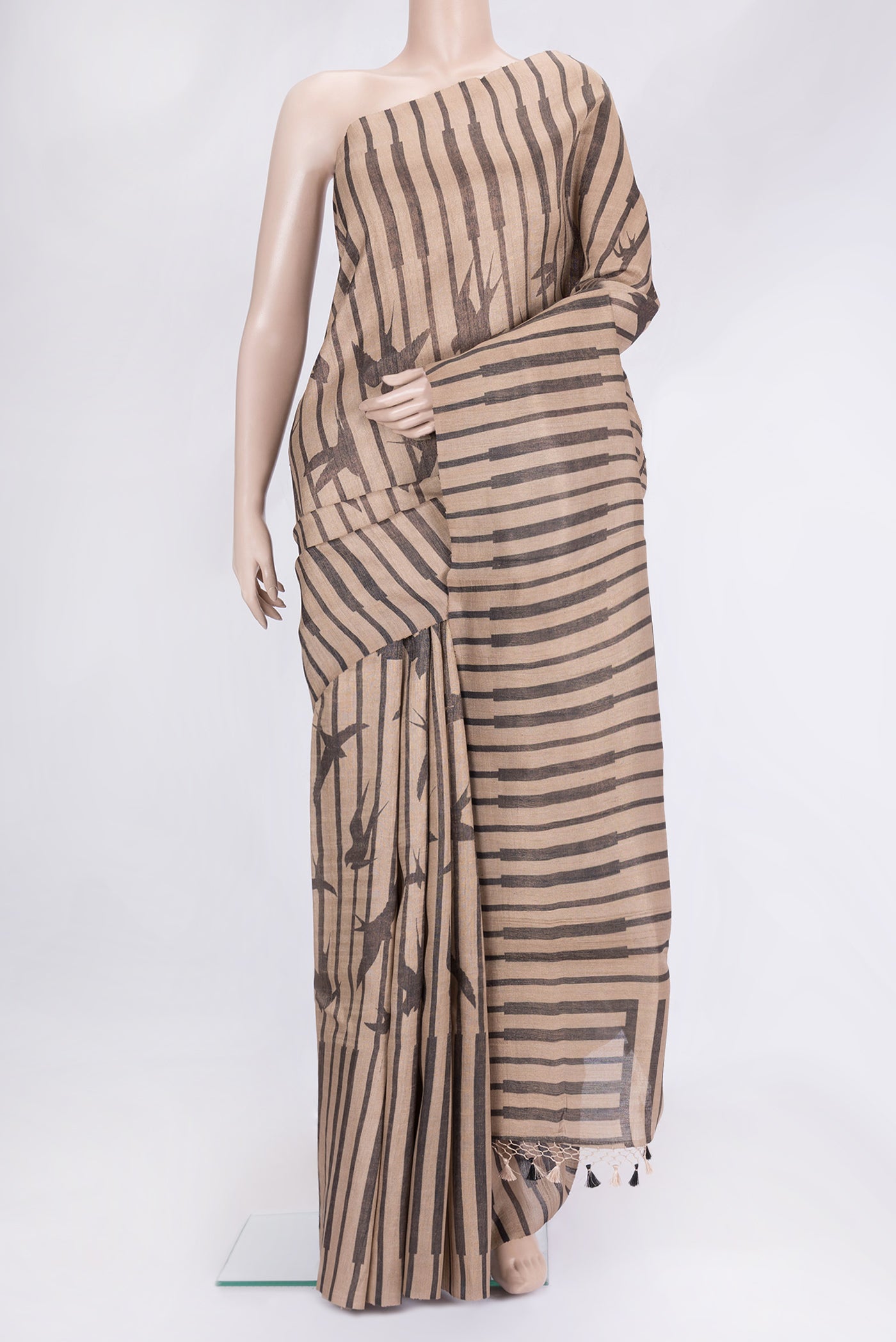 Brown Dual Tone Tussar Silk Saree with Stripes on the body and Without Border.  displayed on a mannequin