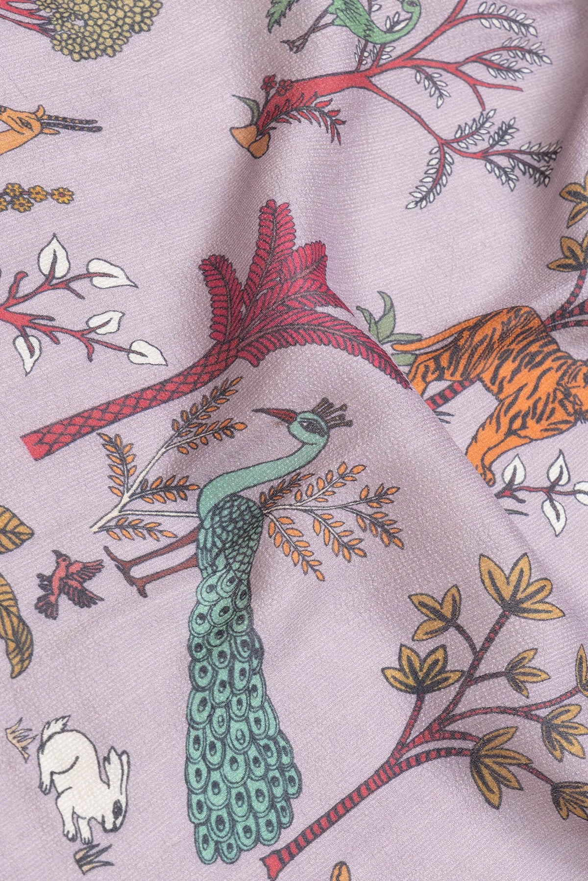 Close up of Lavender Dual Tone Tussar Silk Saree with Printed design on the body and Zari Border.  displaying folds