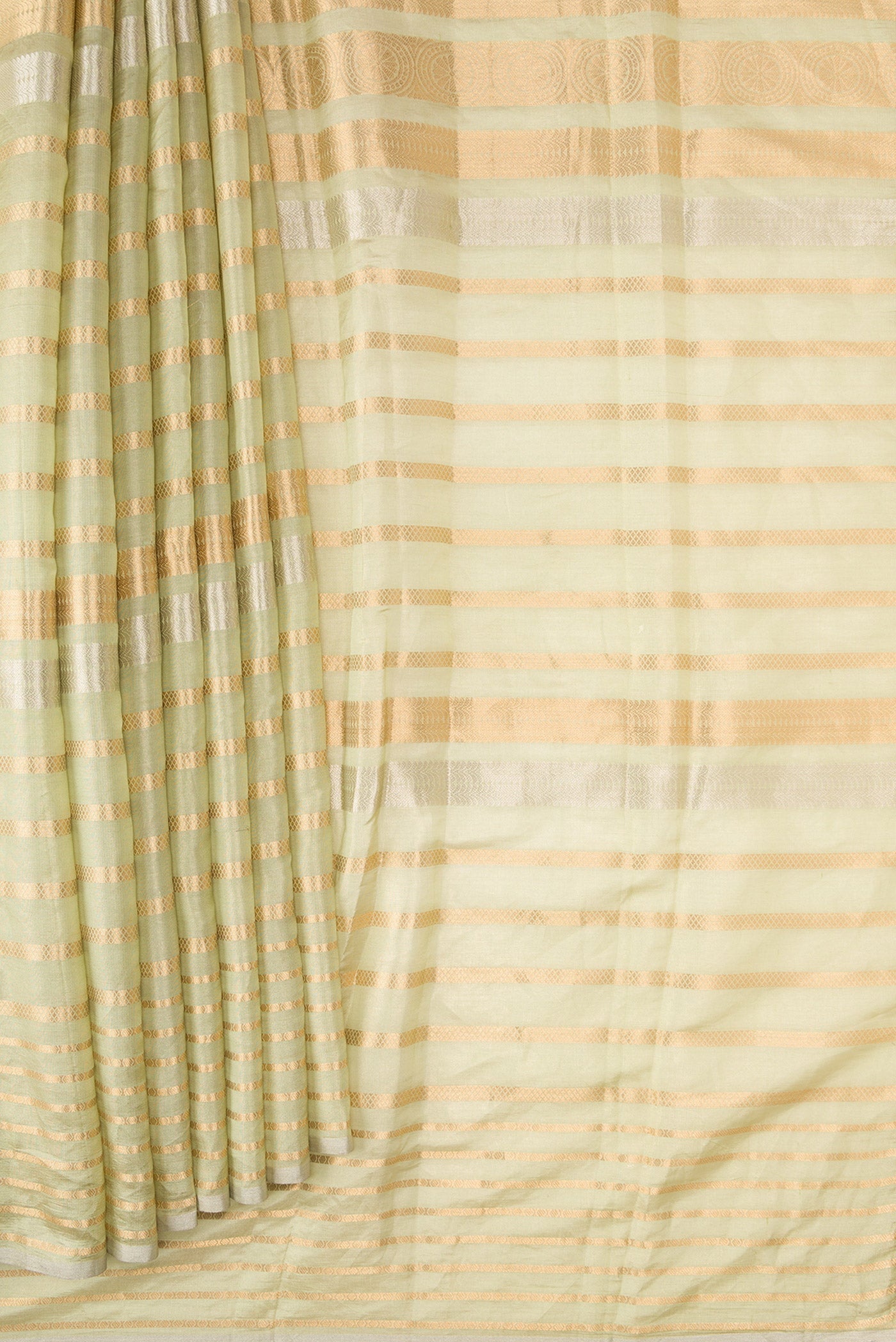 Pleats and pallu of Pista Green Dual Tone Organza Silk Saree with Stripes on the body and Without Border. 