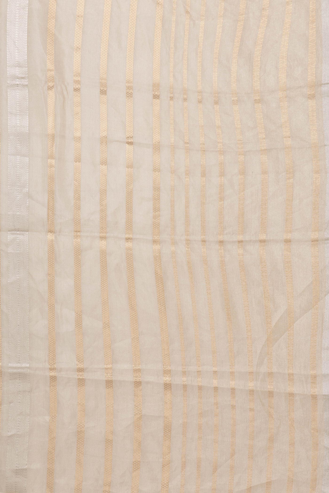 Border image of Gold Dual Tone Organza Silk Saree with Zari Brocade on the body and Zari Border