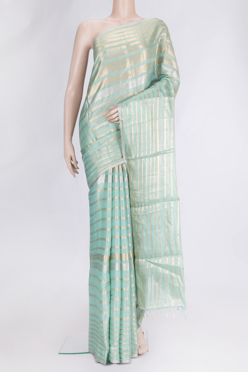 Sea Green Dual Tone Organza Silk Saree with Stripes on the body and Zari Border.  displayed on a mannequin