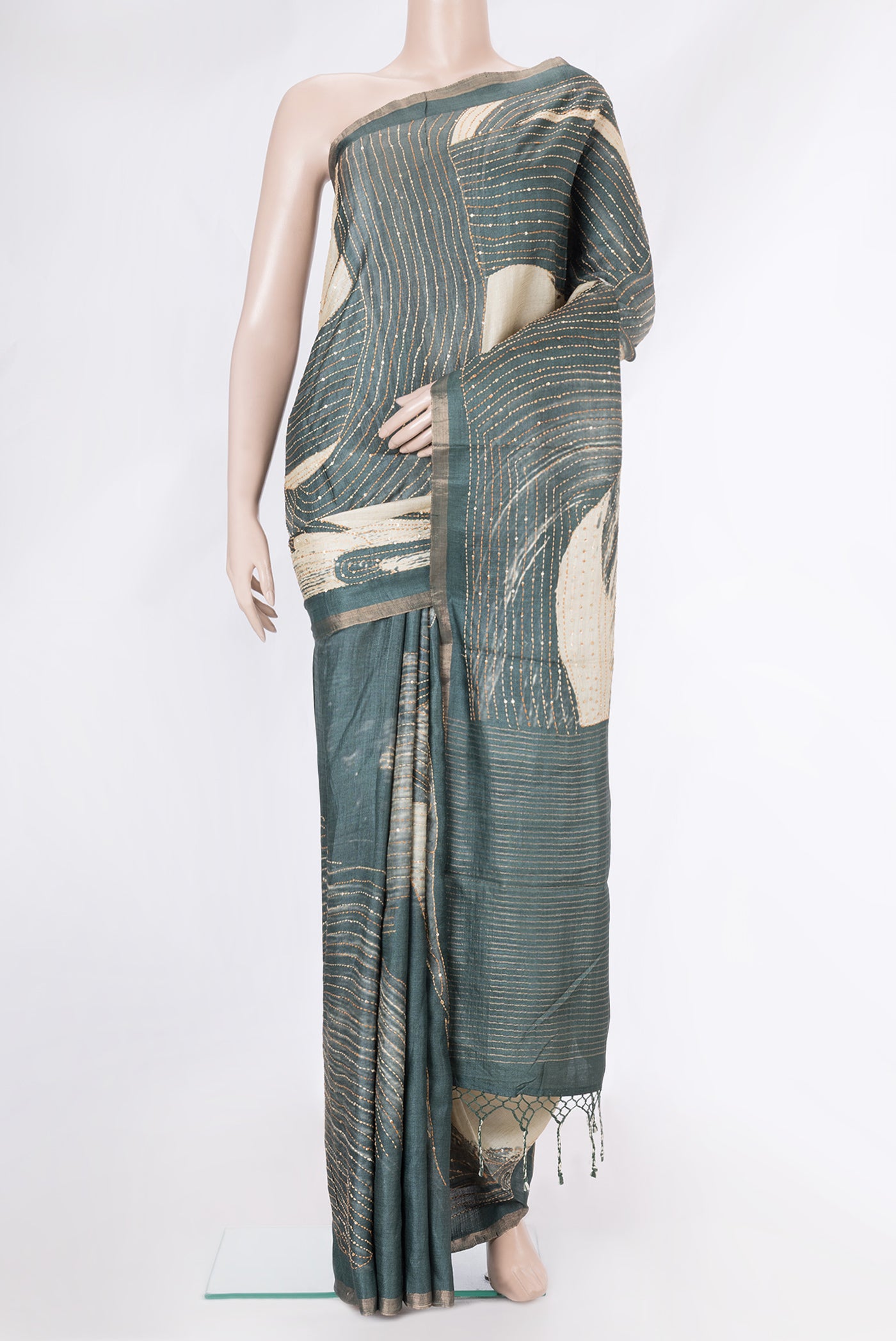 Beige Dual Tone Tussar Silk Saree with Plain Body and Embroidery Border.  displayed on a mannequin
