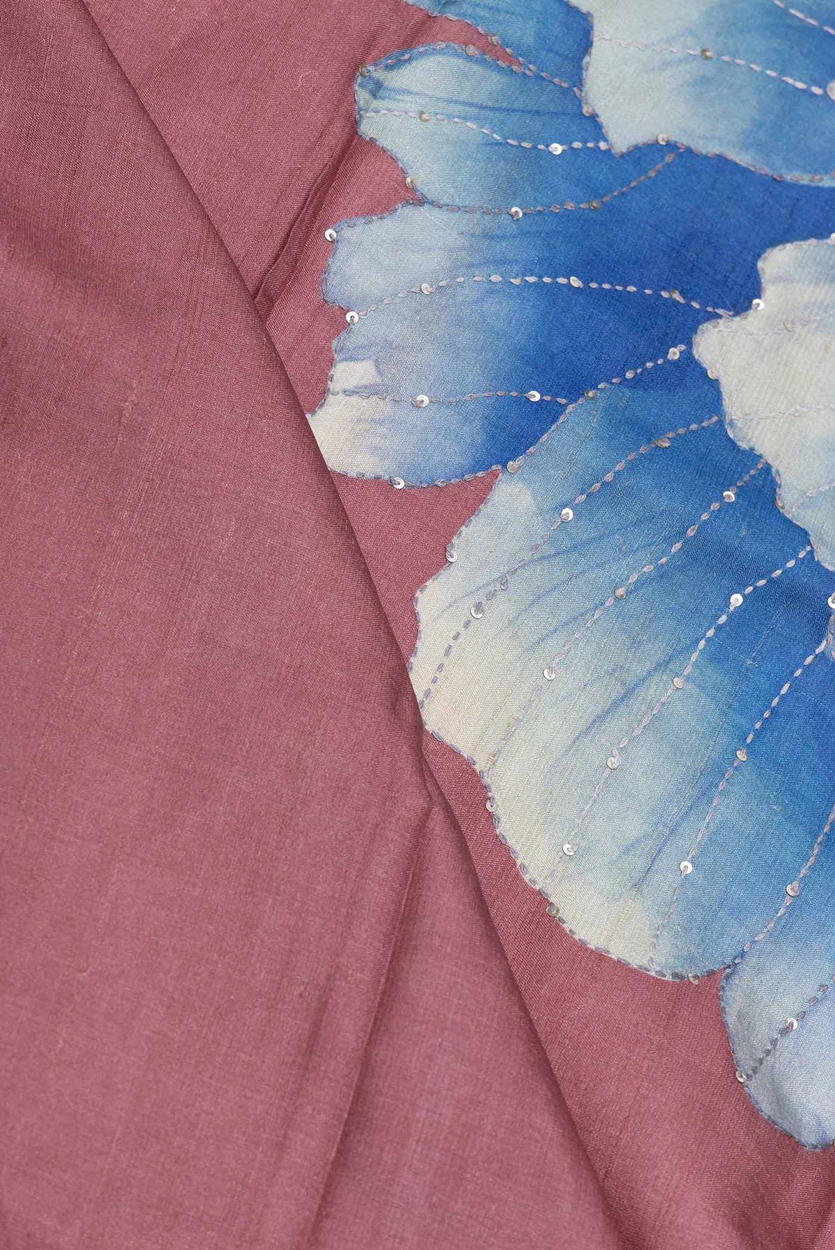 Close up of Blue Dual Tone Blended Tussar Silk Saree with Embroidery on the body and Zari Border displaying folds