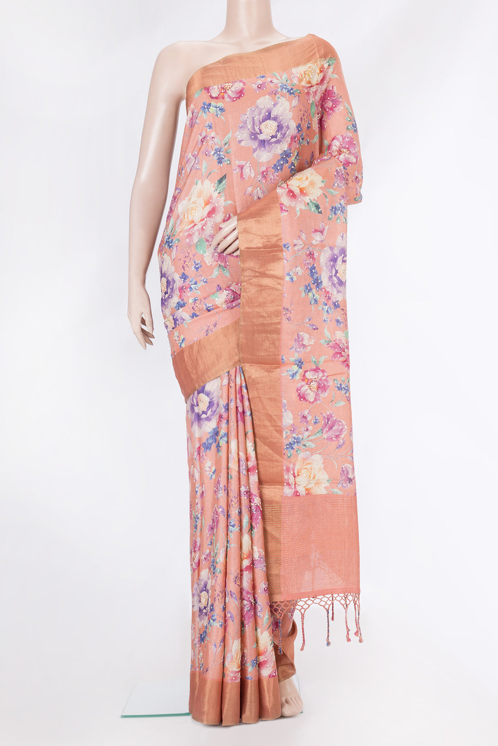 Peach Dual Tone Tussar Silk Saree with Embroidery on the body and Zari Border.  displayed on a mannequin