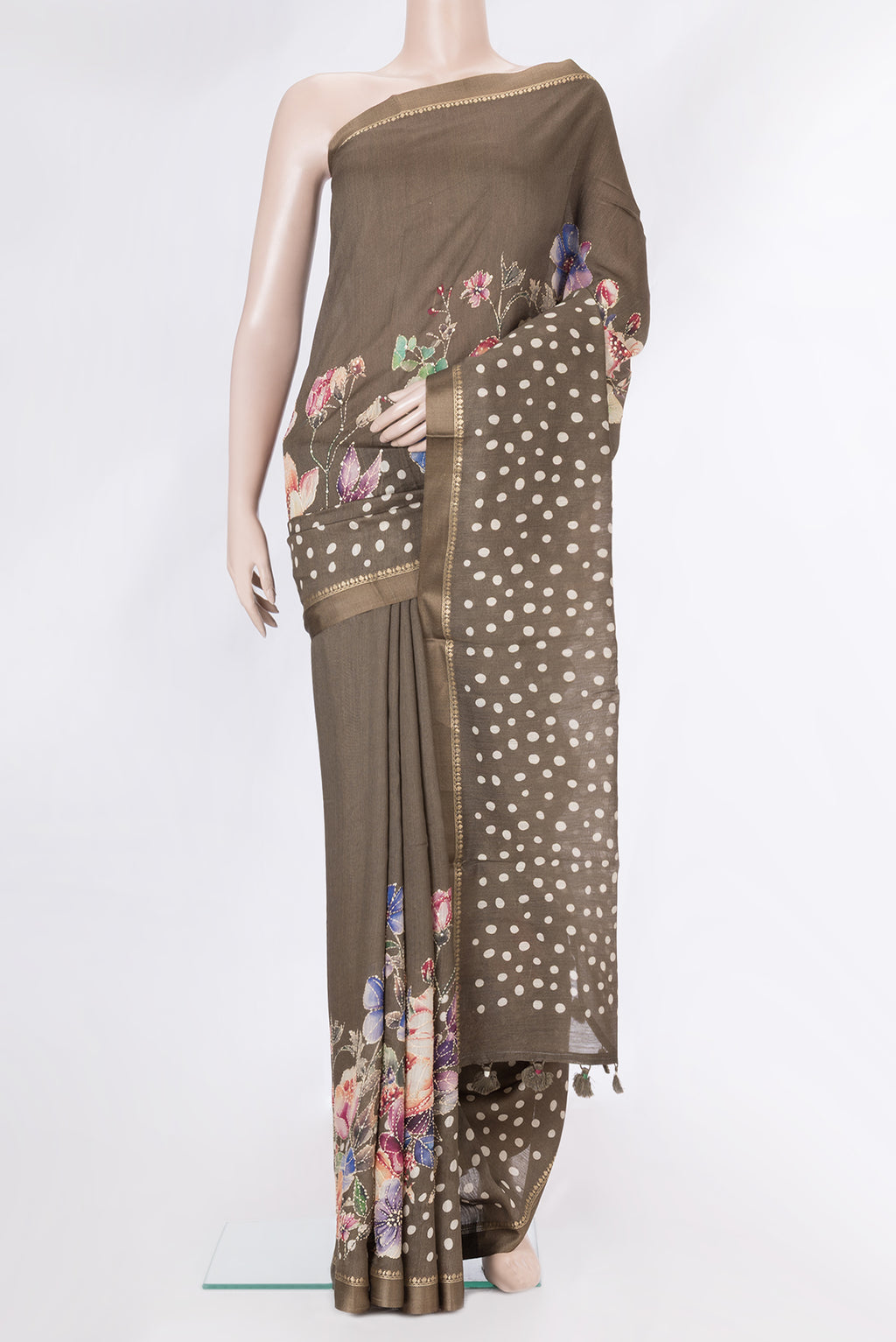 Brown Dual Tone Tussar Silk Saree with Embroidery on the body and Zari Border.  displayed on a mannequin