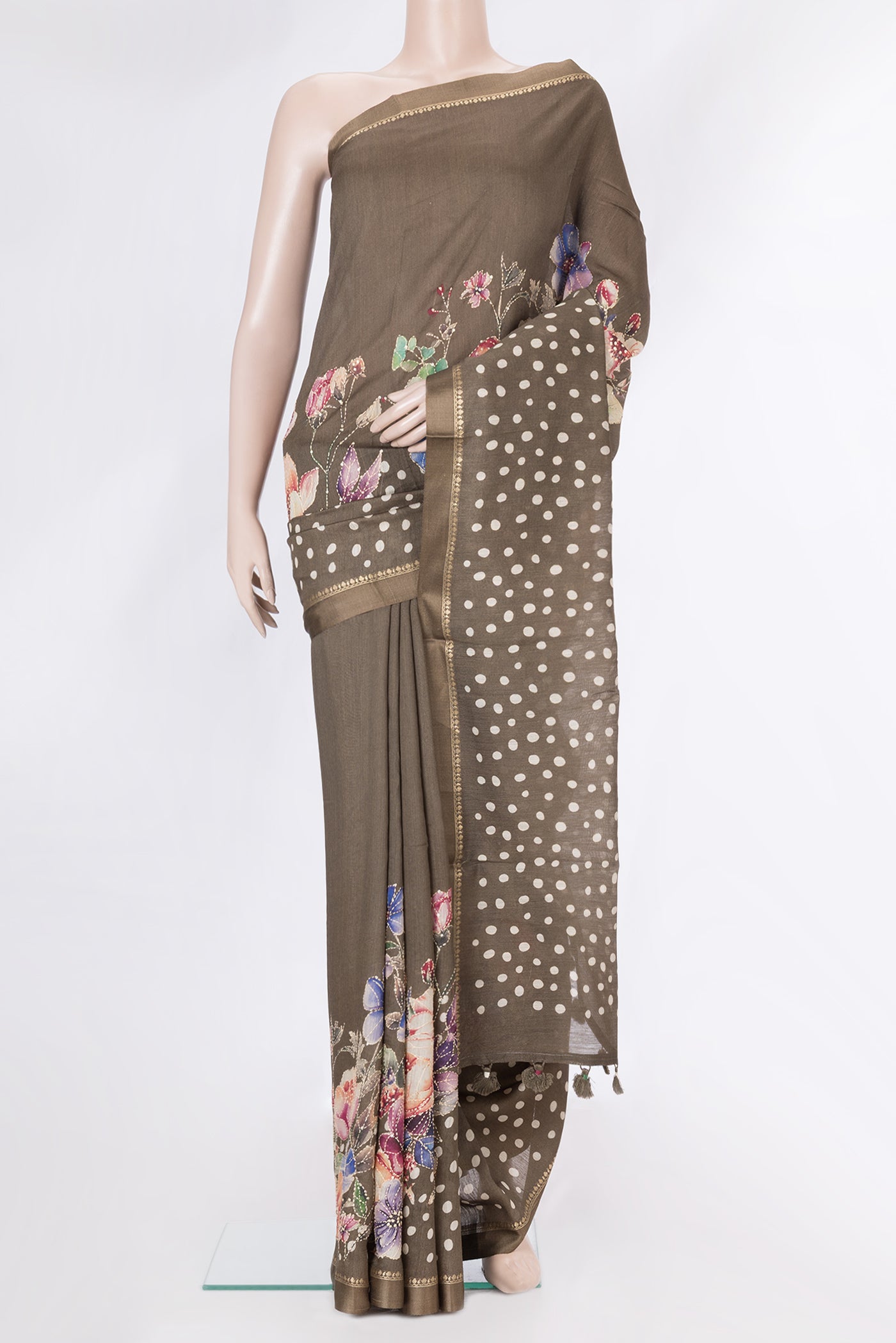 Brown Dual Tone Tussar Silk Saree with Embroidery on the body and Zari Border.  displayed on a mannequin