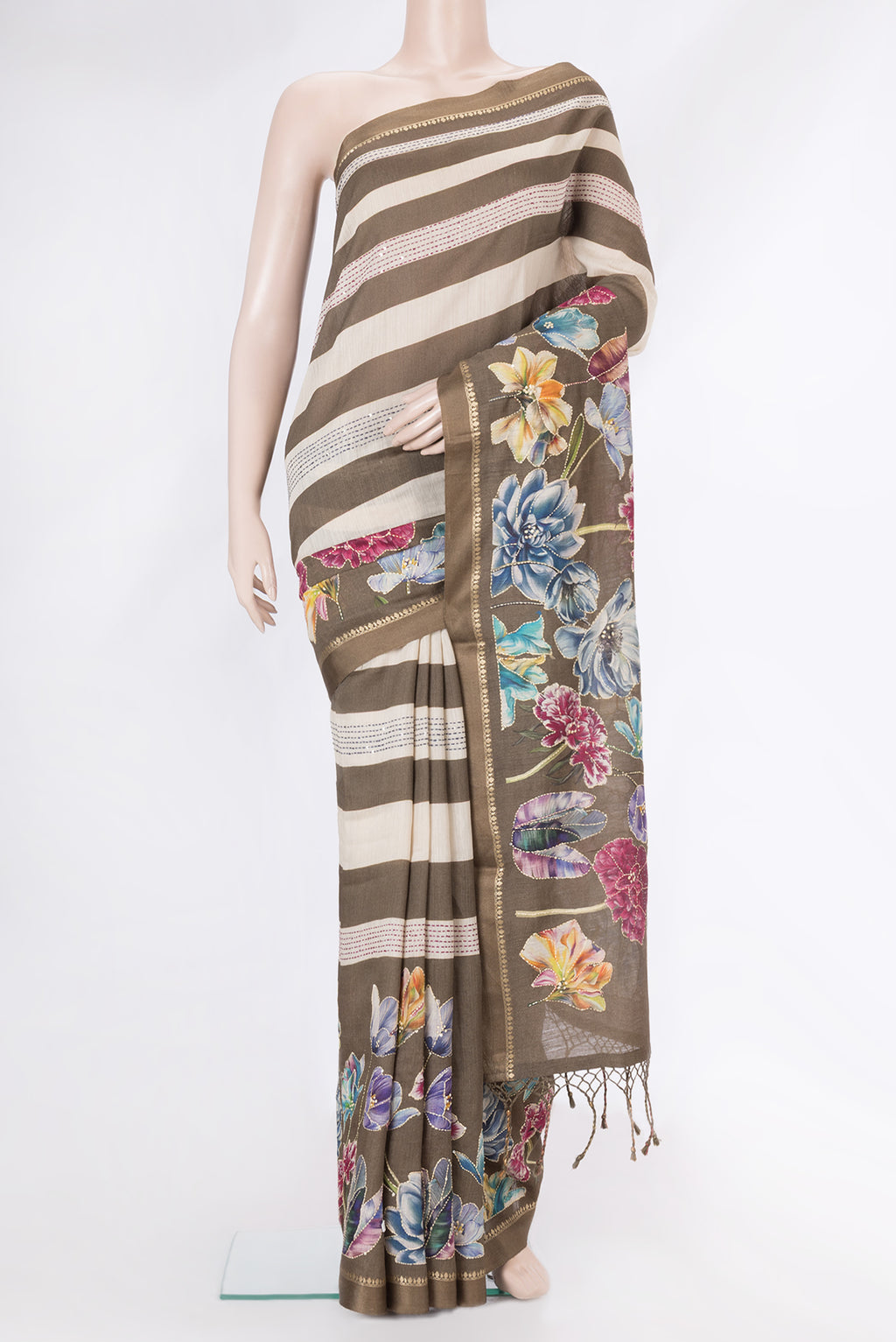 Mehandi Green Dual Tone Tussar Silk Saree with Embroidery on the body and Zari Border.  displayed on a mannequin