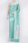Light Green Dual Tone Banarasi Silk Saree with Zari Brocade on the body and Zari Border displayed on a mannequin