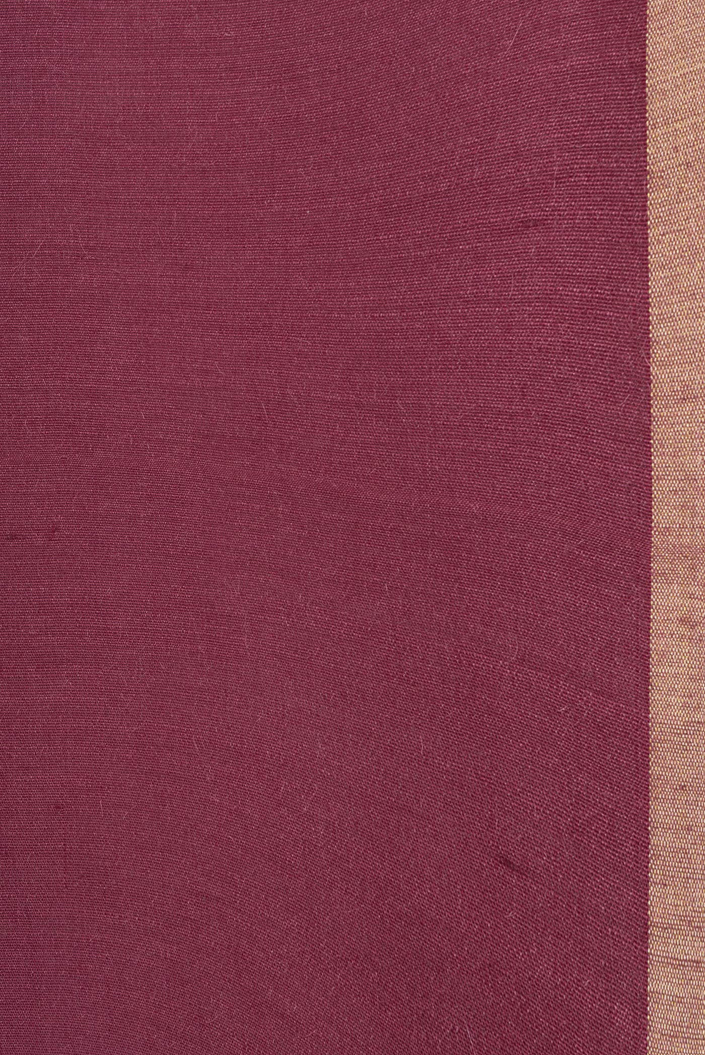 Border image of Maroon Dual Tone Tussar Silk Saree with Plain Body and Thin Zari Line. 