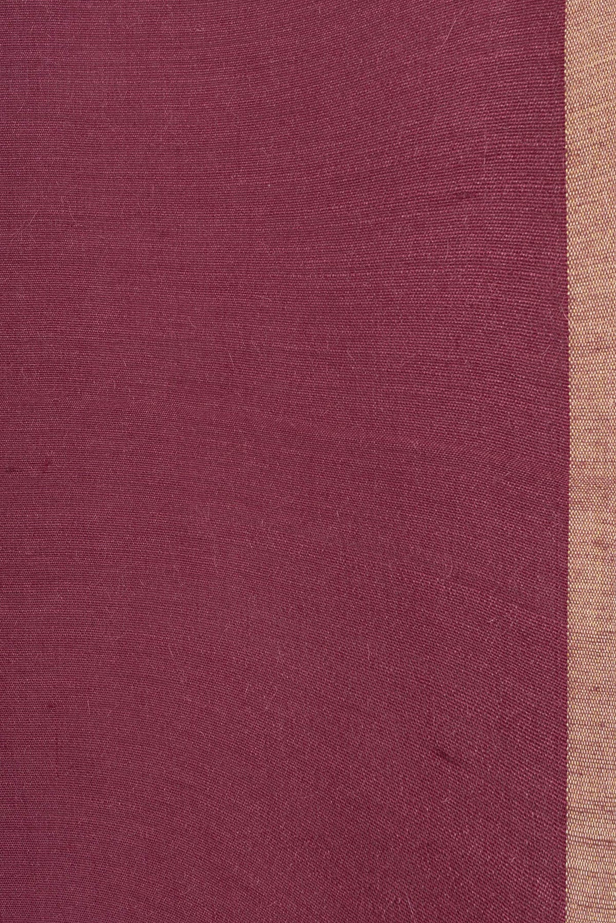 Border image of Maroon Dual Tone Tussar Silk Saree with Plain Body and Thin Zari Line. 