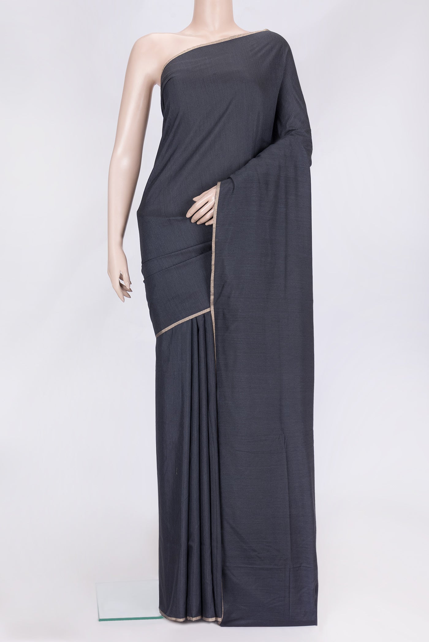 Grey Dual Tone Tussar Silk Saree with Plain Body and Fancy Border.  displayed on a mannequin