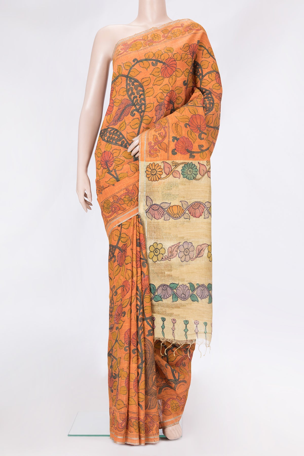 Orange Dual Tone Tussar Silk Saree with kalamkari Print on the body and Printed Border.  displayed on a mannequin