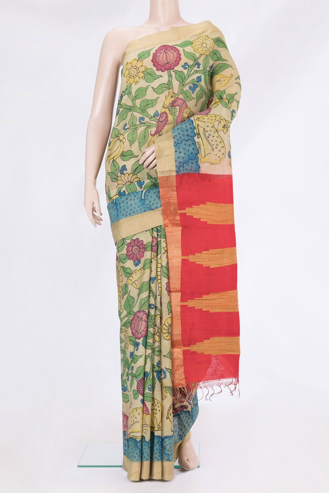 Beige Dual Tone Raw Silk Saree with kalamkari Print on the body and Zari Border.  displayed on a mannequin