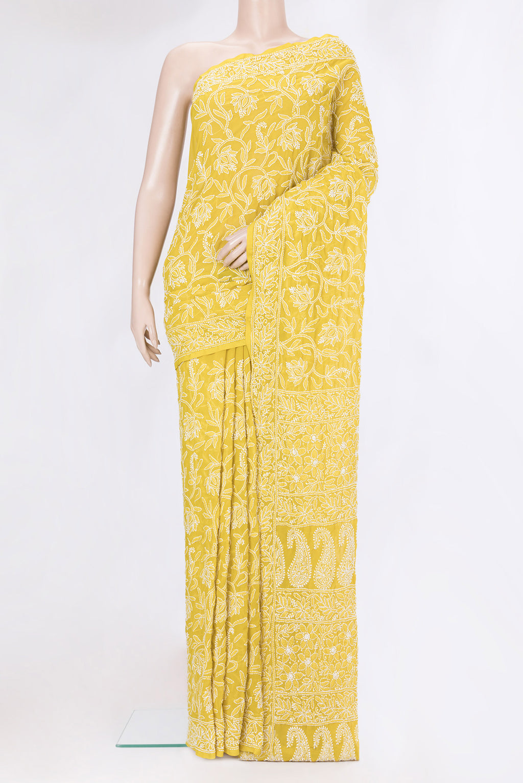 Lemon Yellow Georgette Saree with Embroidery on the body and Embroidery Border.  displayed on a mannequin