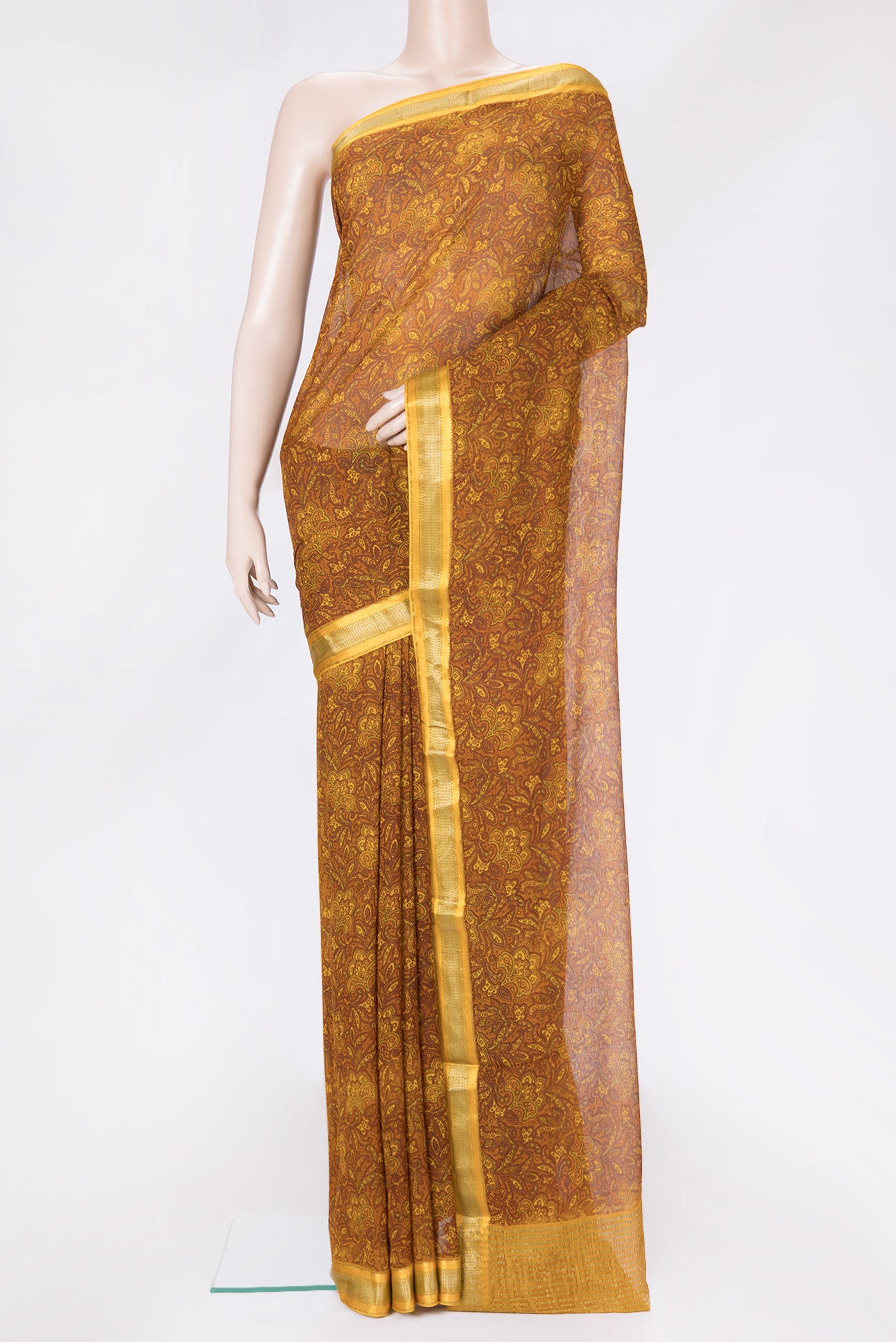 Mustard Dual Tone Mysore Georgette Saree with Printed design on the body and Zari Border.  displayed on a mannequin