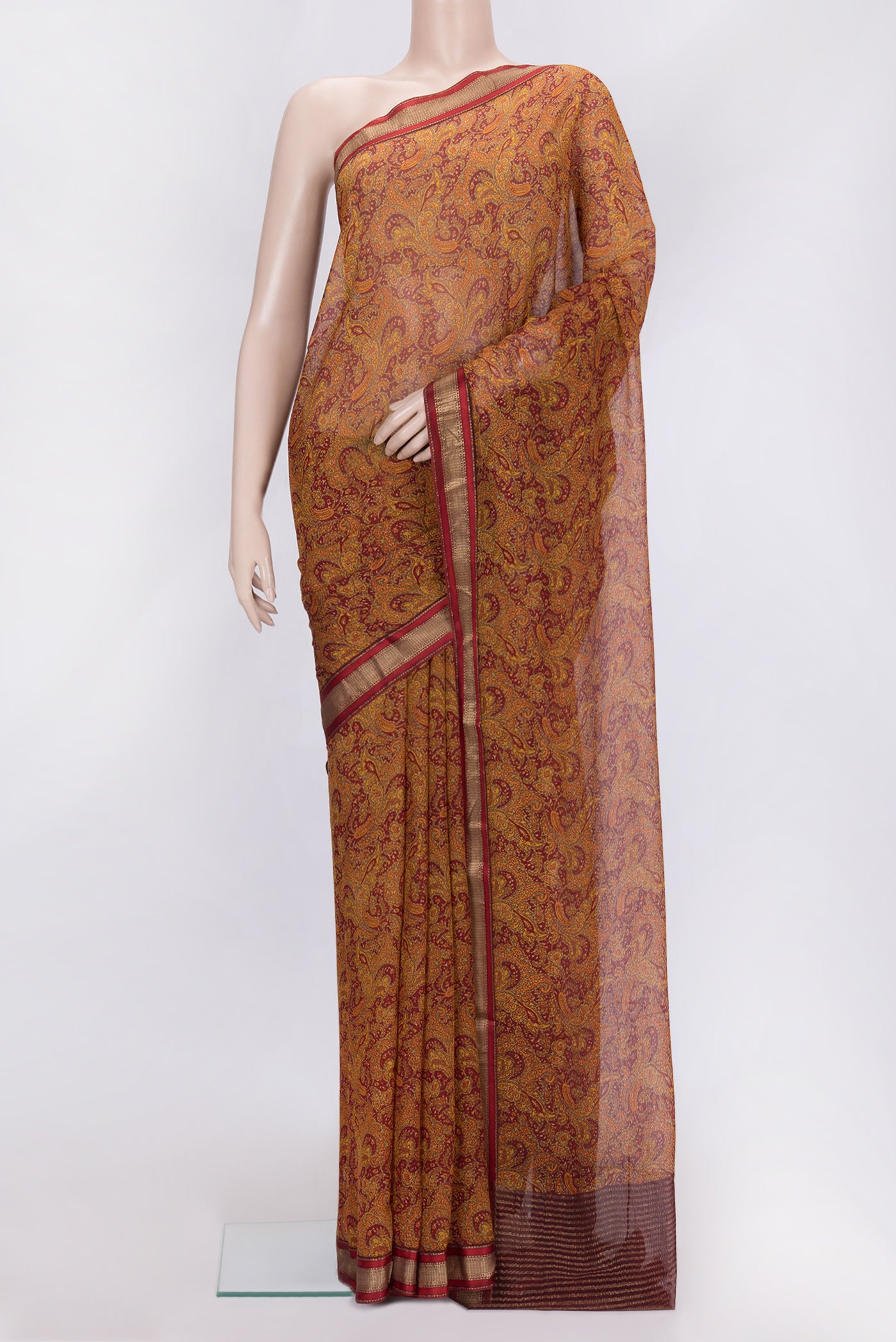 Maroon Dual Tone Mysore Chiffon Saree with Printed design on the body and Zari Border.  displayed on a mannequin