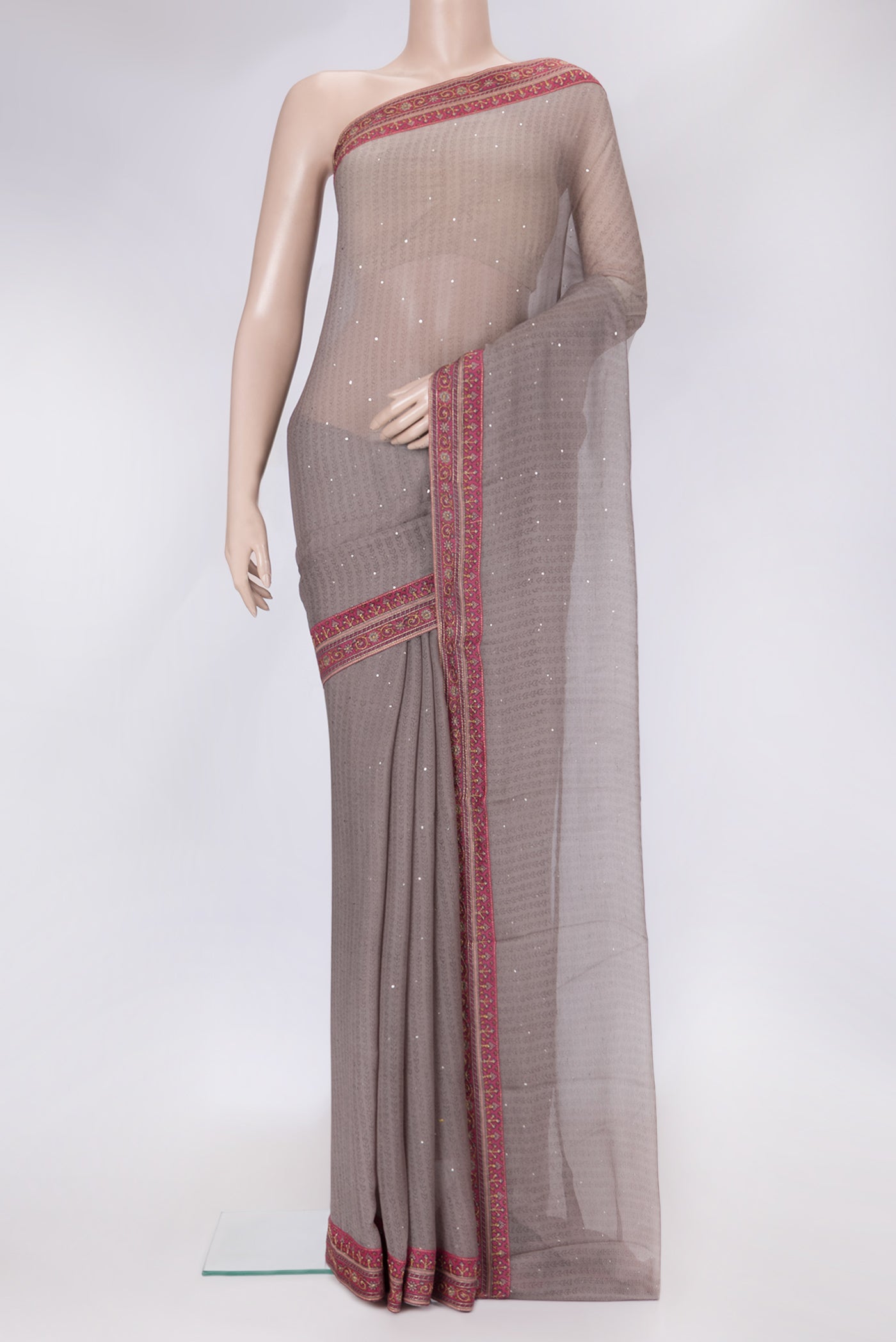 Grey Dual Tone Mysore Chiffon Saree with Printed design on the body and Embroidery Border.  displayed on a mannequin