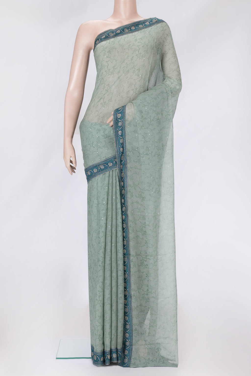 Light Green Dual Tone Mysore Chiffon Saree with Embroidery on the body and Embroidery Border.  displayed on a mannequin