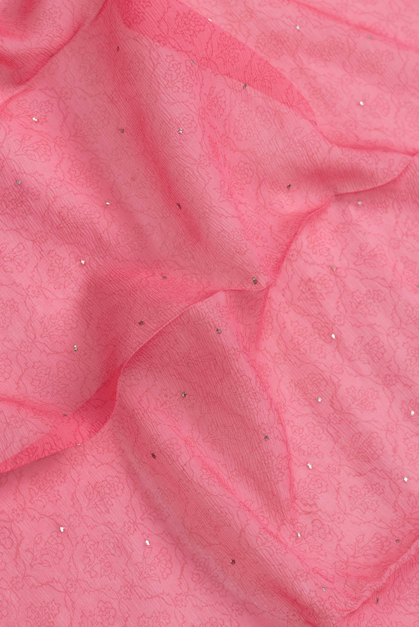 Close up of Pink Dual Tone Mysore Chiffon Saree with Embroidery on the body and Embroidery Border.  displaying folds