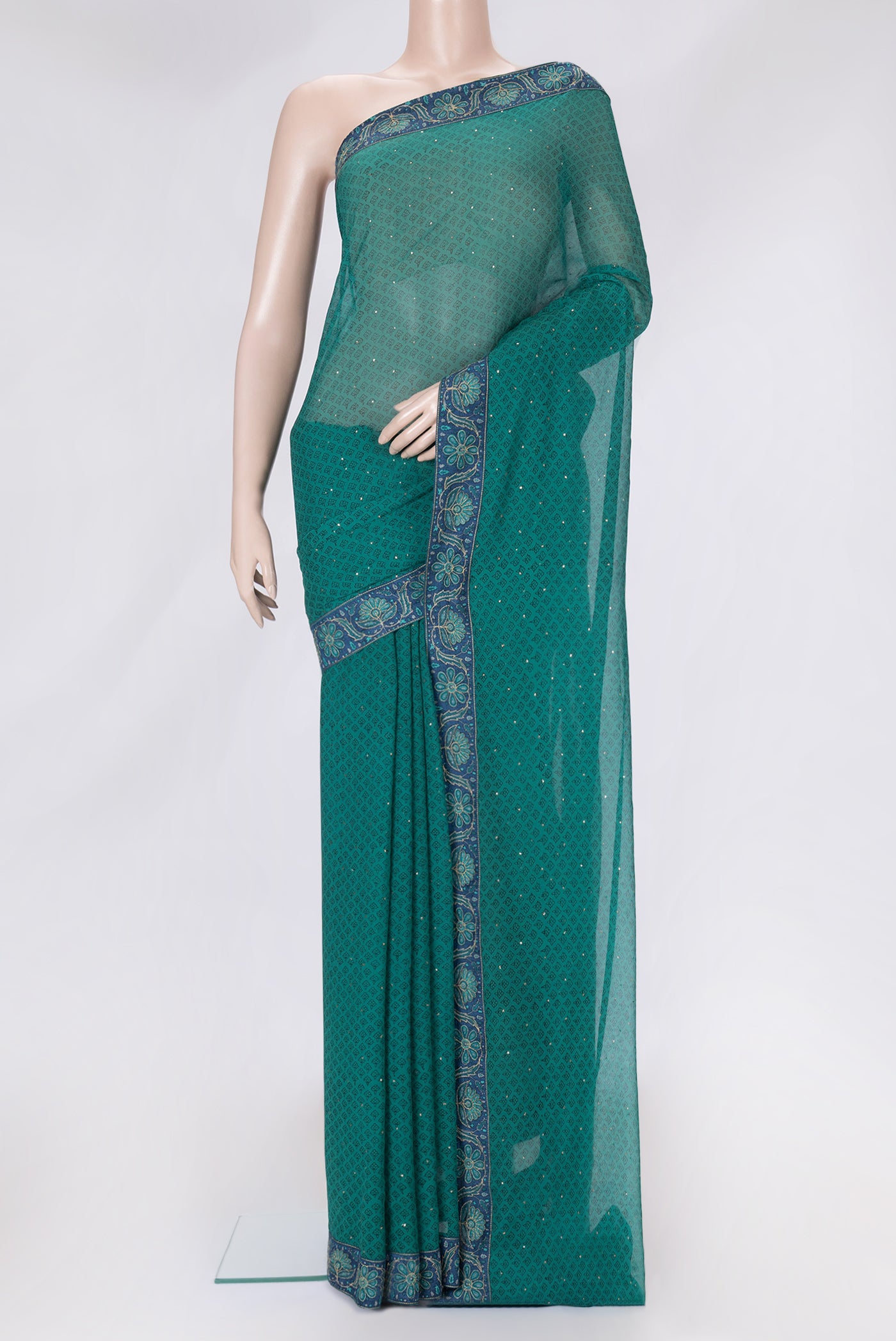 Green Dual Tone Mysore Chiffon Saree with Embroidery on the body and Embroidery Border.  displayed on a mannequin