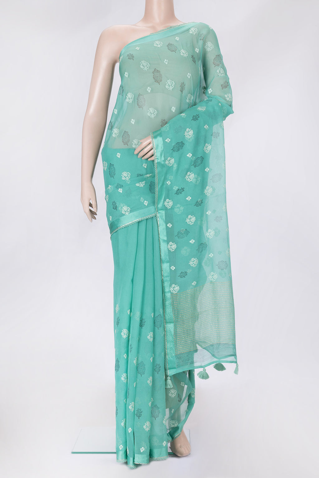 Sea Green Dual Tone Mysore Chiffon Saree with Embroidery on the body and Embroidery Border.  displayed on a mannequin