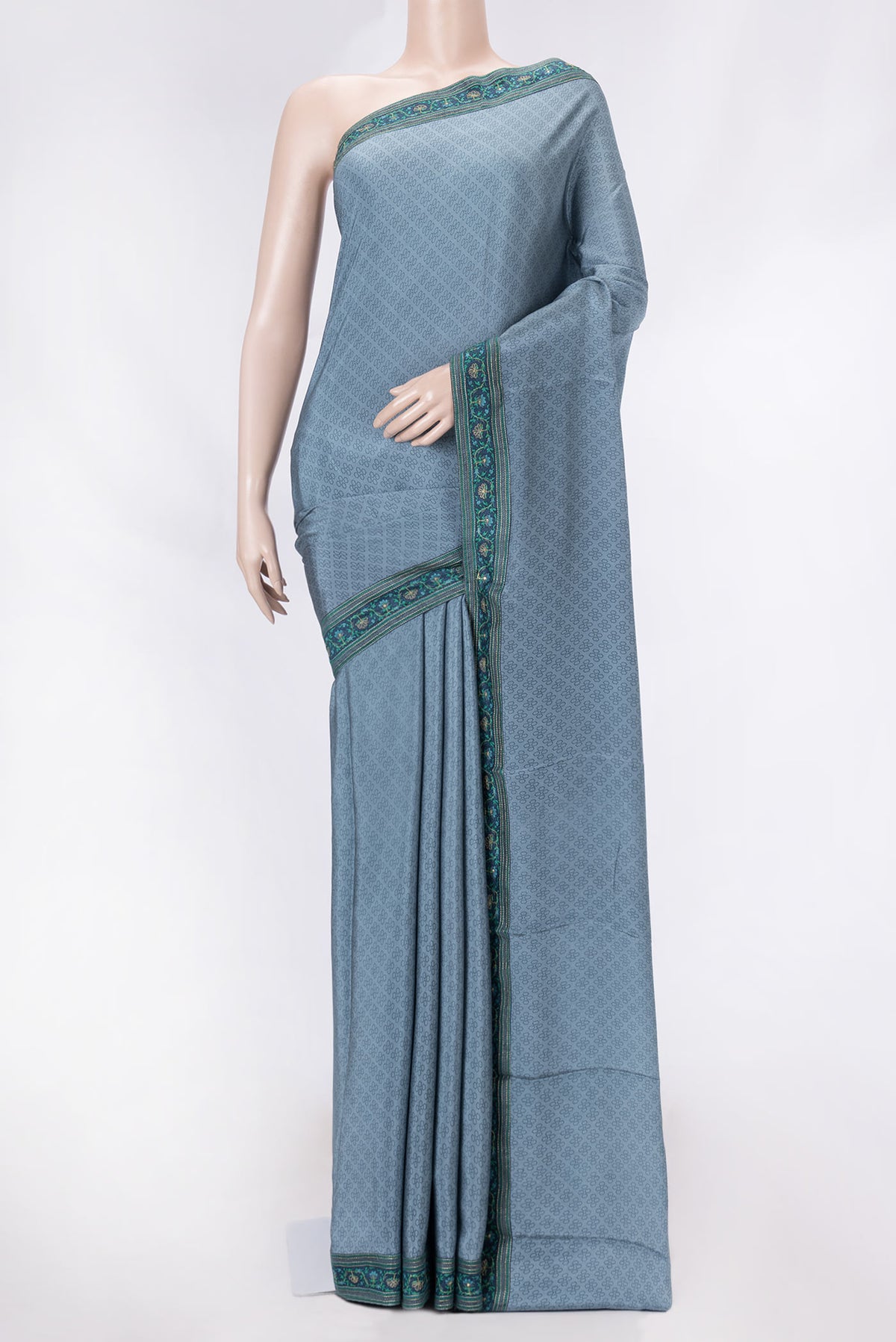 Grey Dual Tone Mysore Crepe Saree with Printed design on the body and Embroidery Border displayed on a mannequin