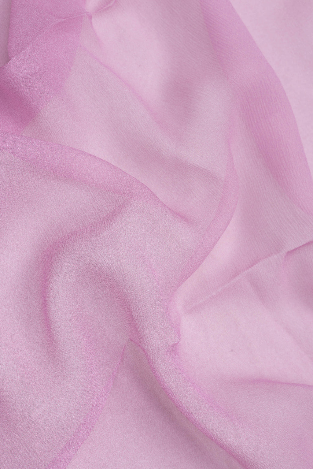 Close up of Lilac Mysore Chiffon Saree with Plain Body and Thread Border.  displaying folds