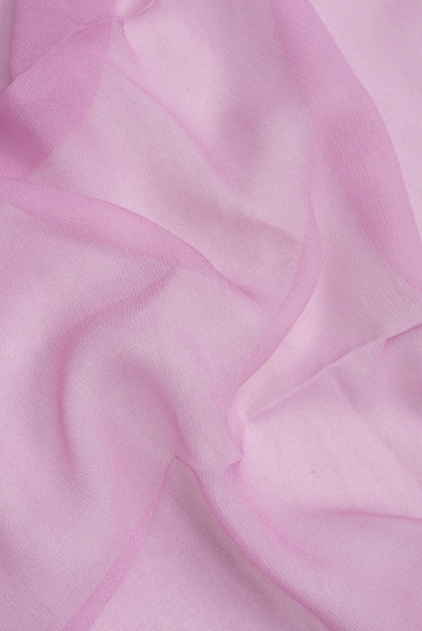 Close up of Lilac Mysore Chiffon Saree with Plain Body and Thread Border.  displaying folds