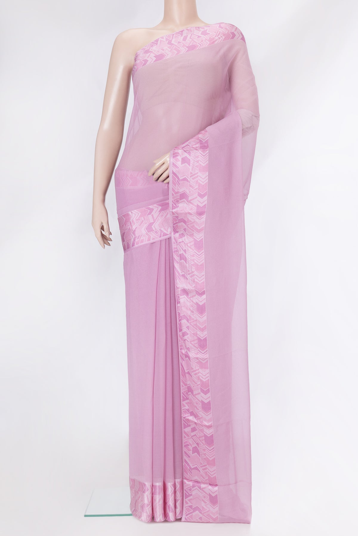 Lilac Mysore Chiffon Saree with Plain Body and Thread Border.  displayed on a mannequin