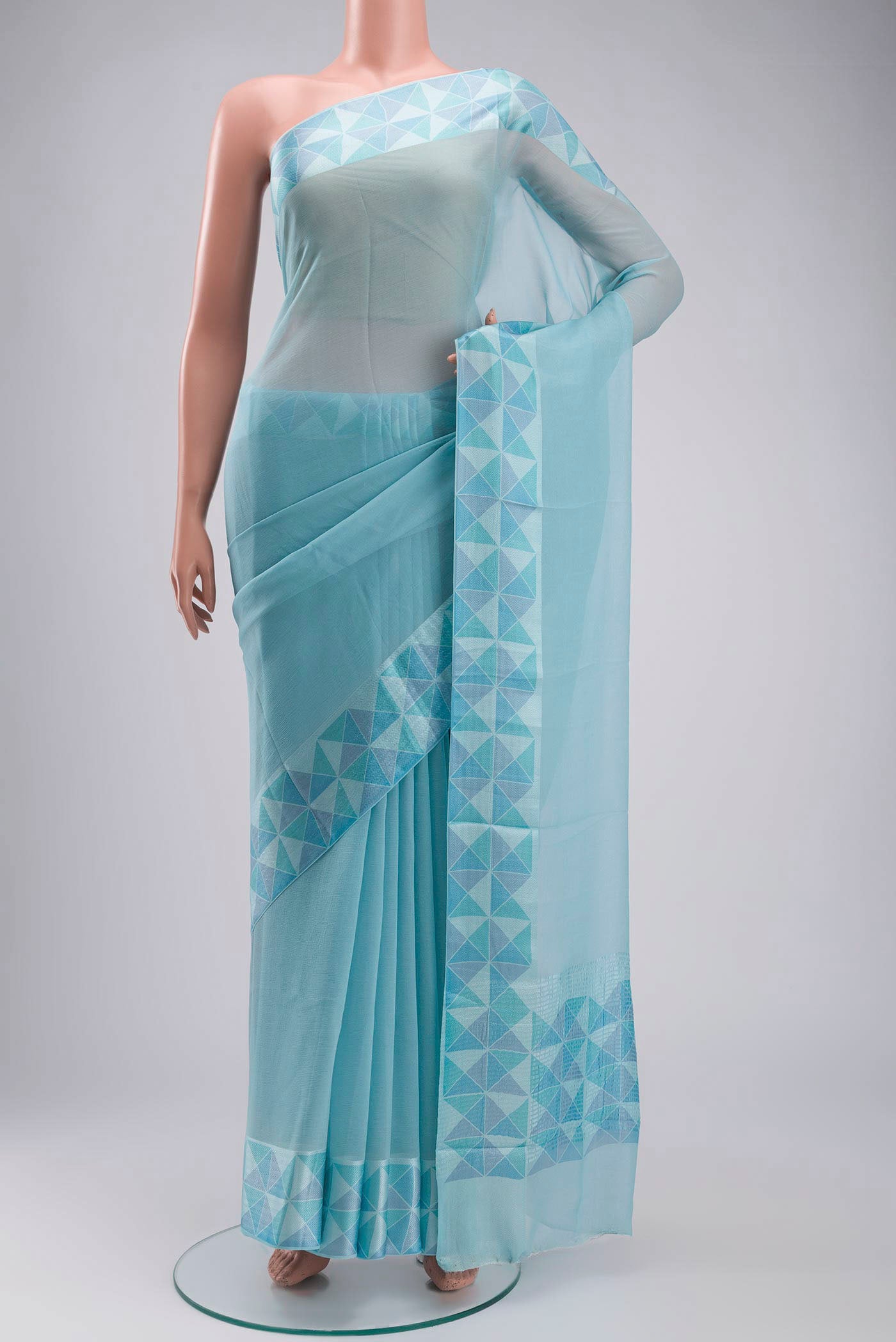 Blue Mysore Chiffon Saree with Plain Body and Checks Border displayed on a mannequin