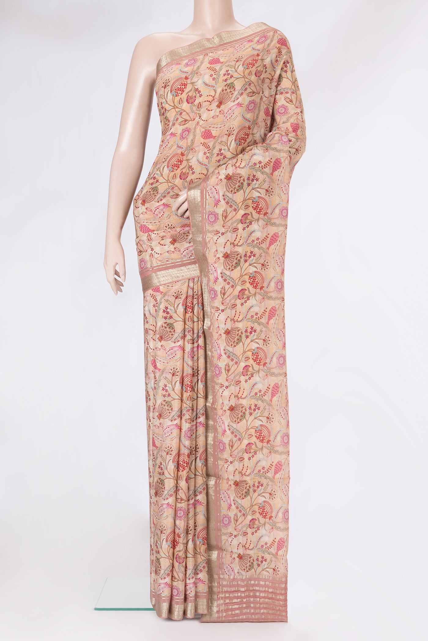 Sandal Dual Tone Crepe Saree with Printed design on the body and Zari Border.  displayed on a mannequin