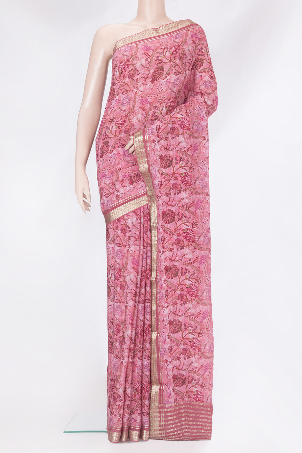 Pink Crepe Saree with Printed design on the body and Zari Border.  displayed on a mannequin