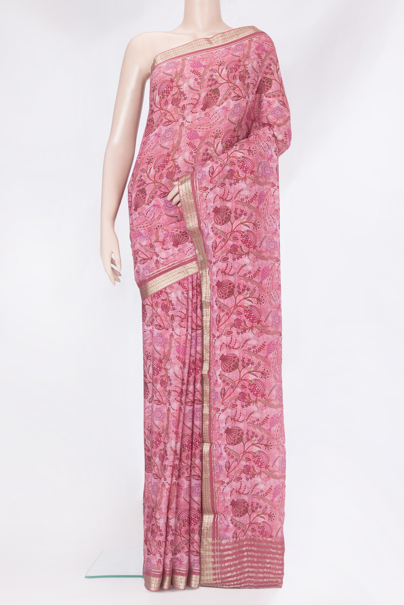 Pink Crepe Saree with Printed design on the body and Zari Border.  displayed on a mannequin