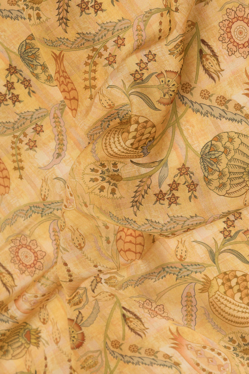 Close up of Sandal Dual Tone Mysore Crepe Saree with Printed design on the body and Zari Border.  displaying folds
