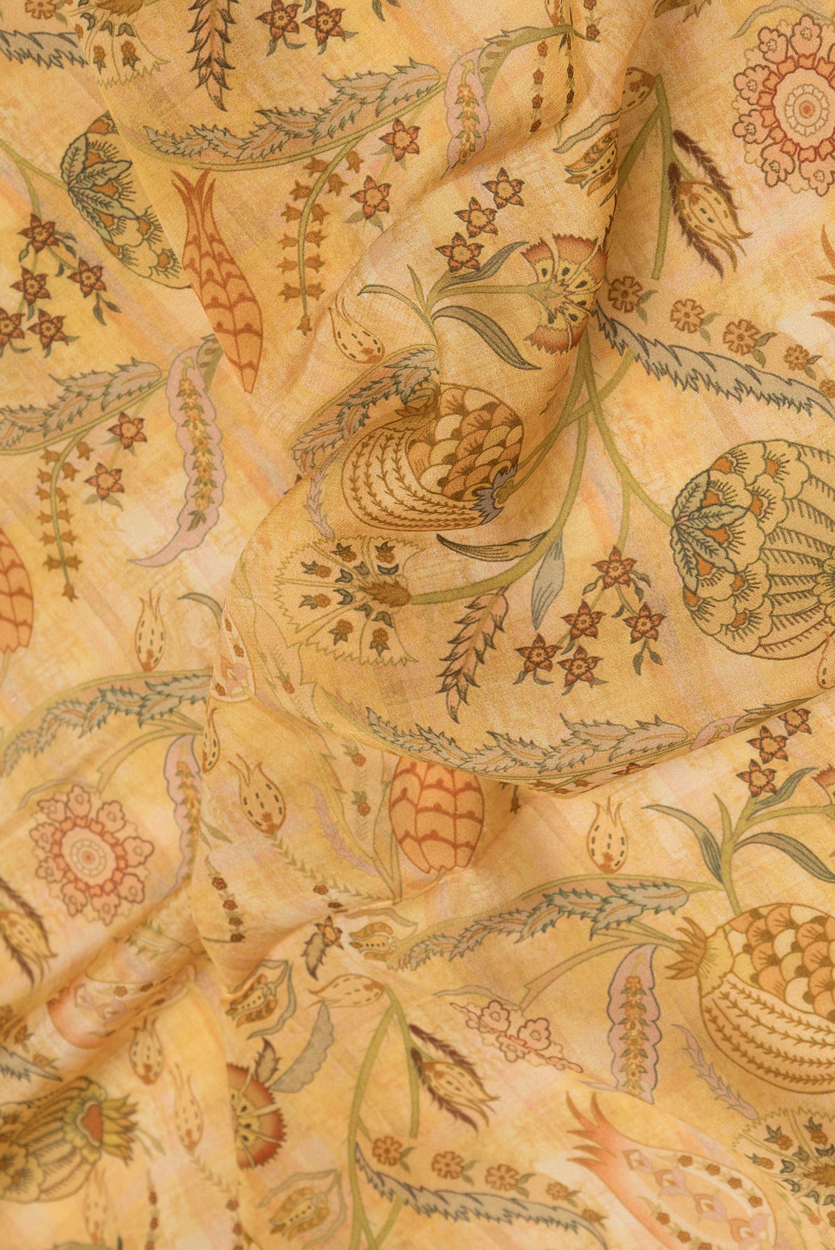 Close up of Sandal Dual Tone Mysore Crepe Saree with Printed design on the body and Zari Border.  displaying folds