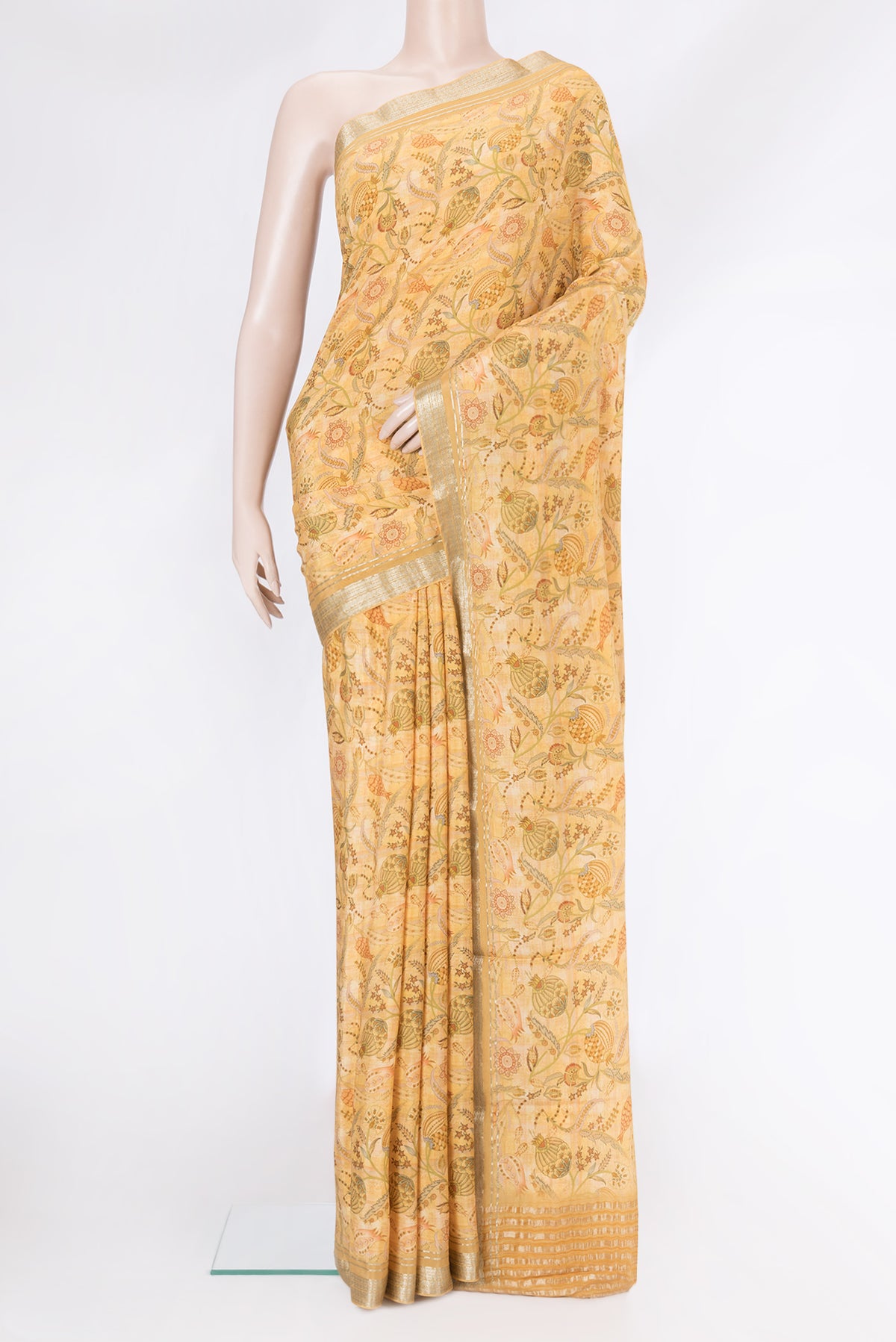 Sandal Dual Tone Mysore Crepe Saree with Printed design on the body and Zari Border.  displayed on a mannequin