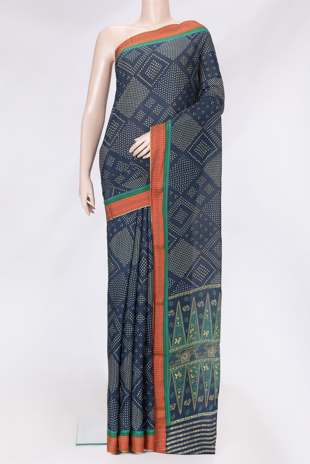 Peacock Blue Dual Tone Mysore Crepe Saree with Printed design on the body and Thread Border.  displayed on a mannequin