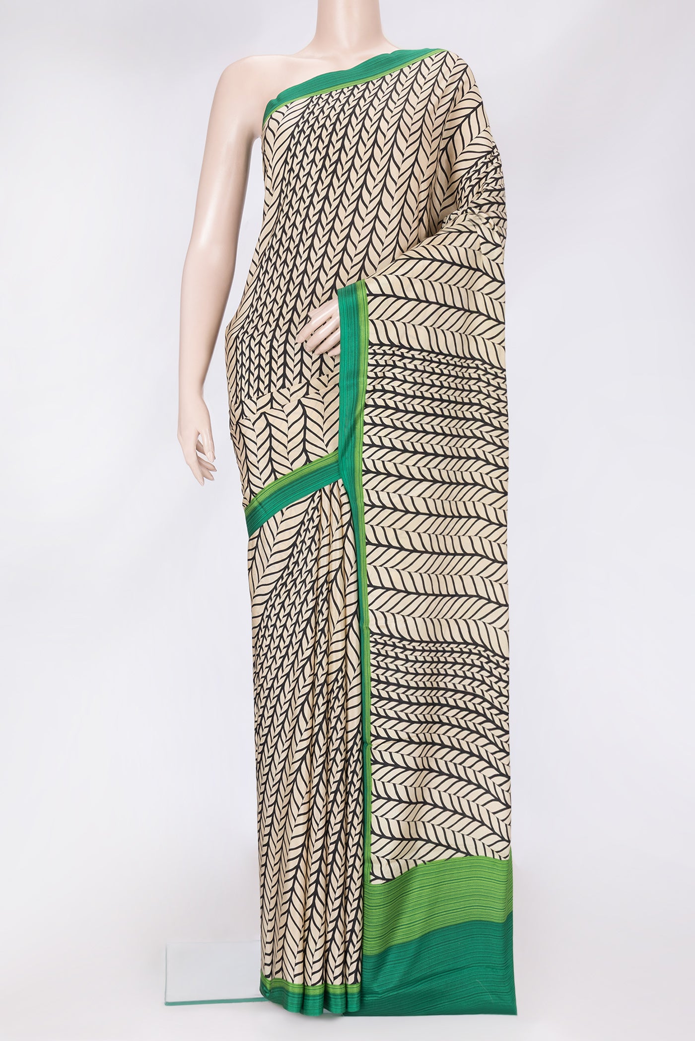 Beige Dual Tone Mysore Crepe Saree with Printed design on the body and Plain Border.  displayed on a mannequin