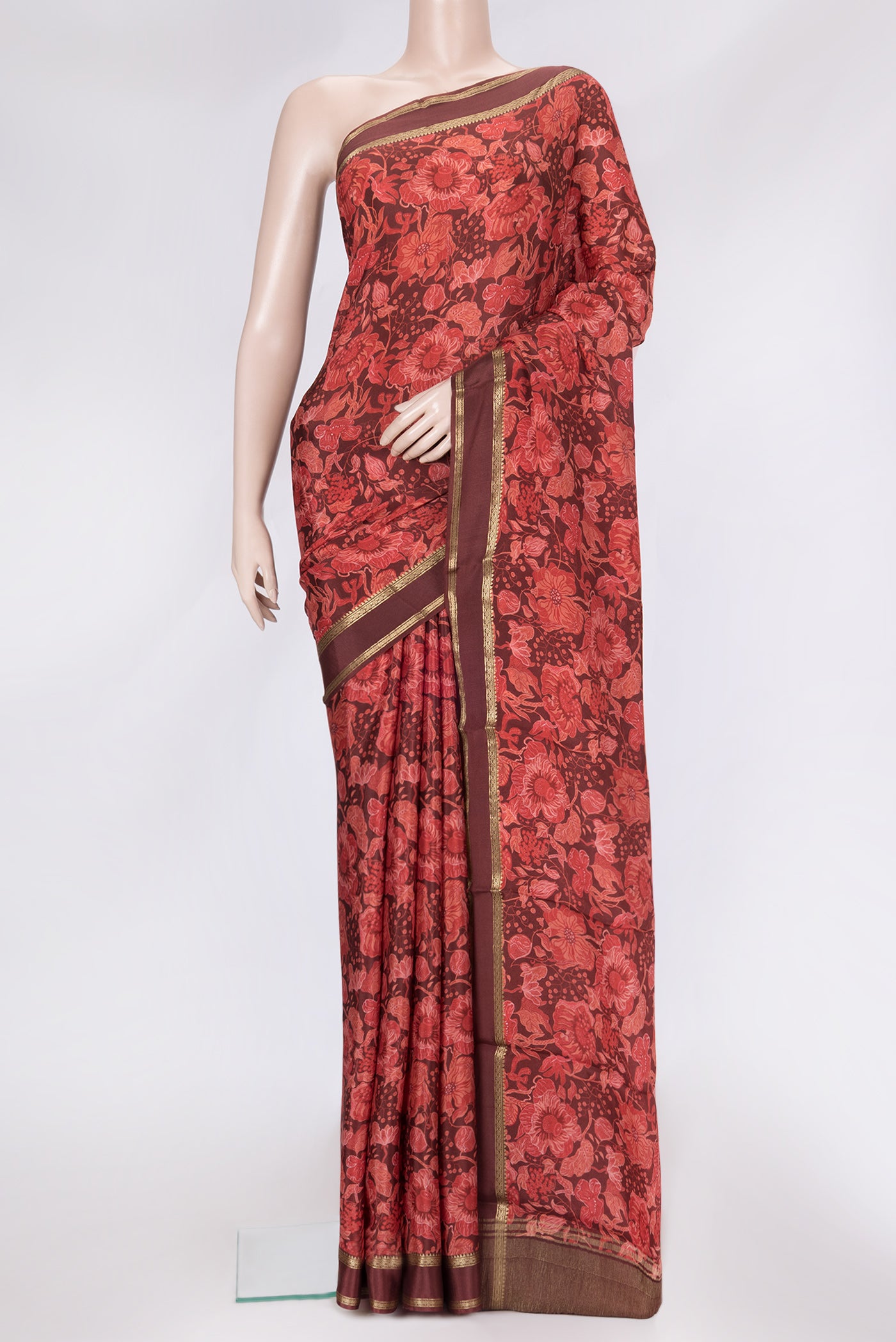 Maroon Dual Tone Mysore Crepe Saree with Printed design on the body and Zari Border.  displayed on a mannequin