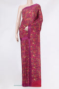 Magenta Dual Tone Crepe Saree with Printed design on the body and Thread Border.  displayed on a mannequin