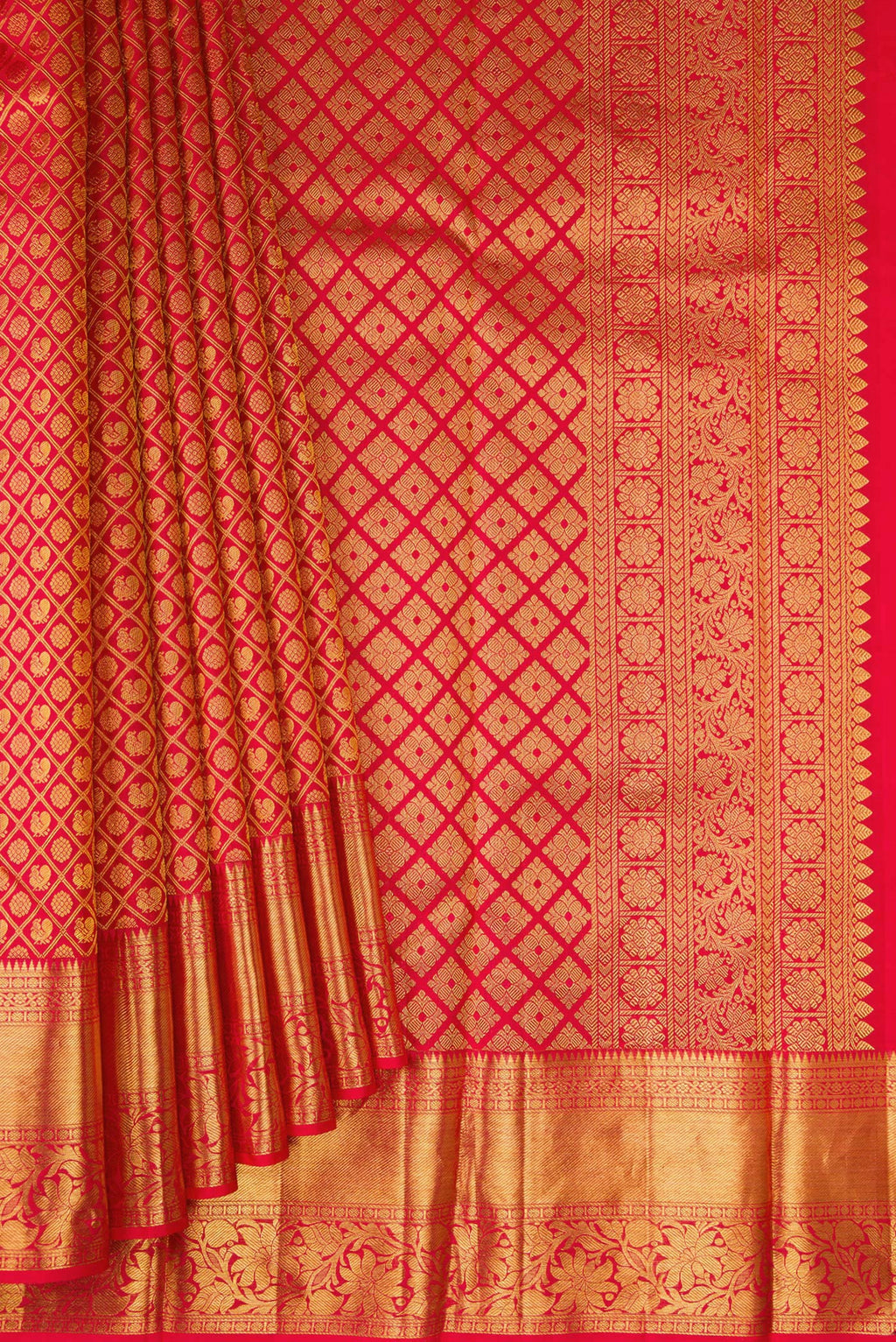 Pleats and pallu of Red Kanchipuram Silk Saree with Zari Brocade on the body and Fancy Border. 