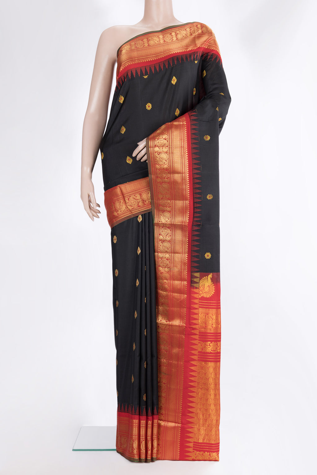 Pure Silk Black Dual Tone Soft Saree with Zari And Thread Butta on the body and Fancy Border.  displayed on a mannequin