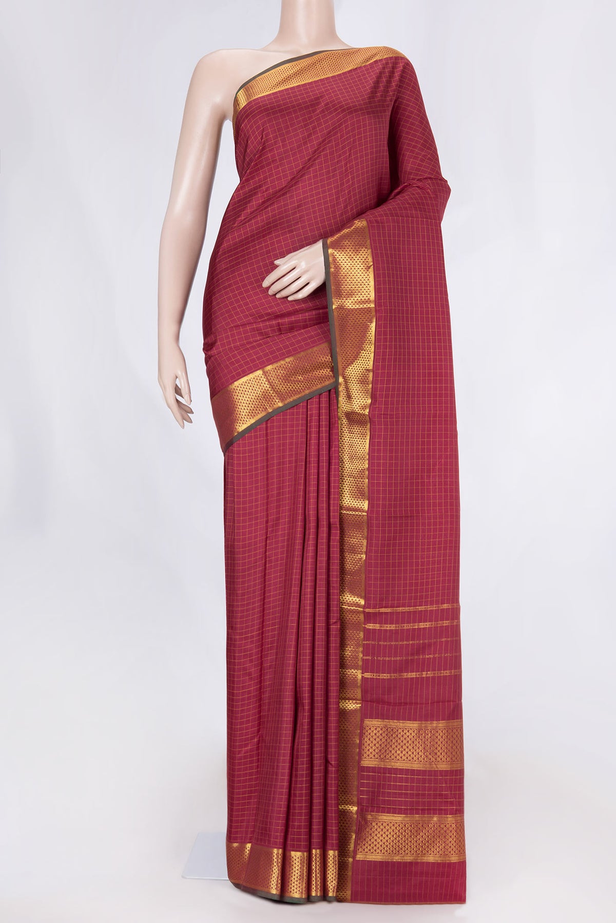 Maroon Dual Tone Kanchipuram Saree with Checked design on the body and Zari Border displayed on a mannequin