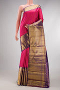Pink Dual Tone Kanchipuram Silk Saree with Zari Brocade on the body and Zari Border.  displayed on a mannequin