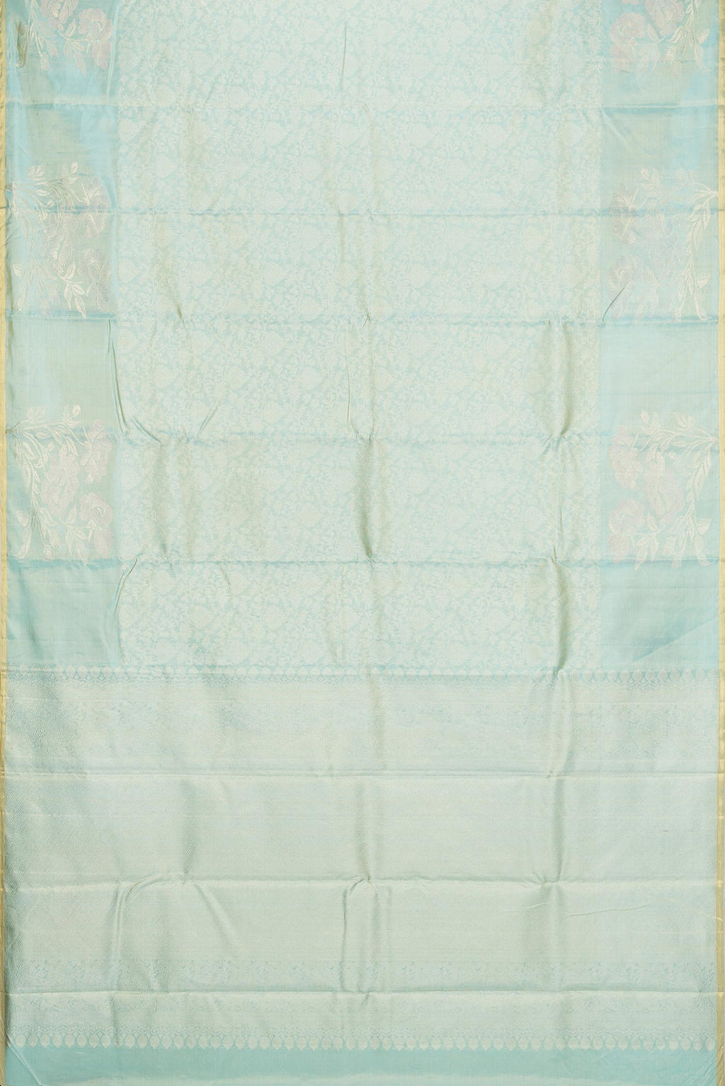Flat view of Light Green Dual Tone Kanchipuram Tissue Saree with Zari Brocade on the body and Fancy Border. 