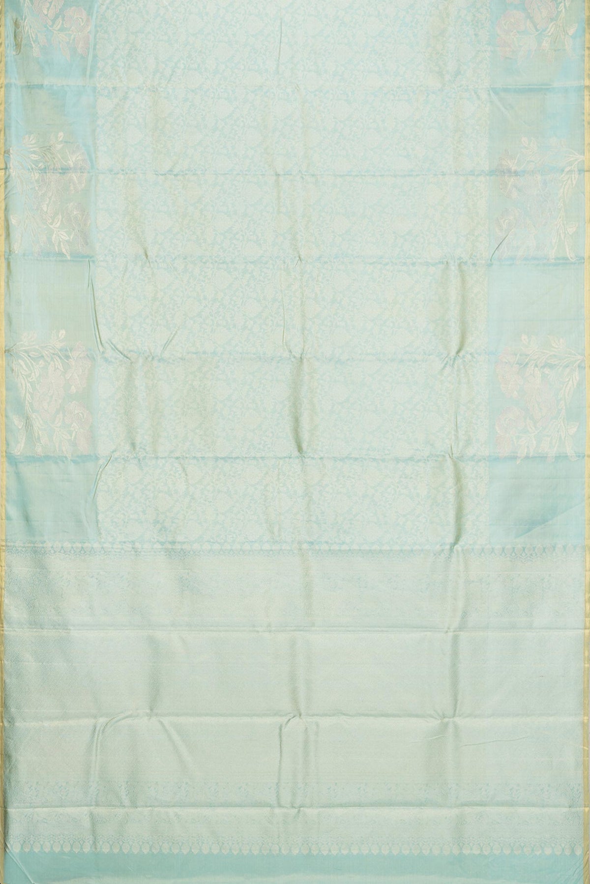Flat view of Light Green Dual Tone Kanchipuram Tissue Saree with Zari Brocade on the body and Fancy Border. 