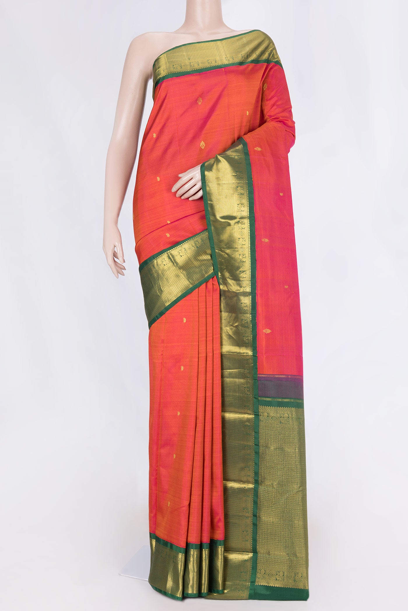 Pink Dual Tone Kanchipuram Silk Saree with Zari Butta on the body and Zari Border displayed on a mannequin