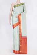 Light Blue Kanchipuram Silk Saree with Veldhari on the body and Ganga Jamuna Border displayed on a mannequin