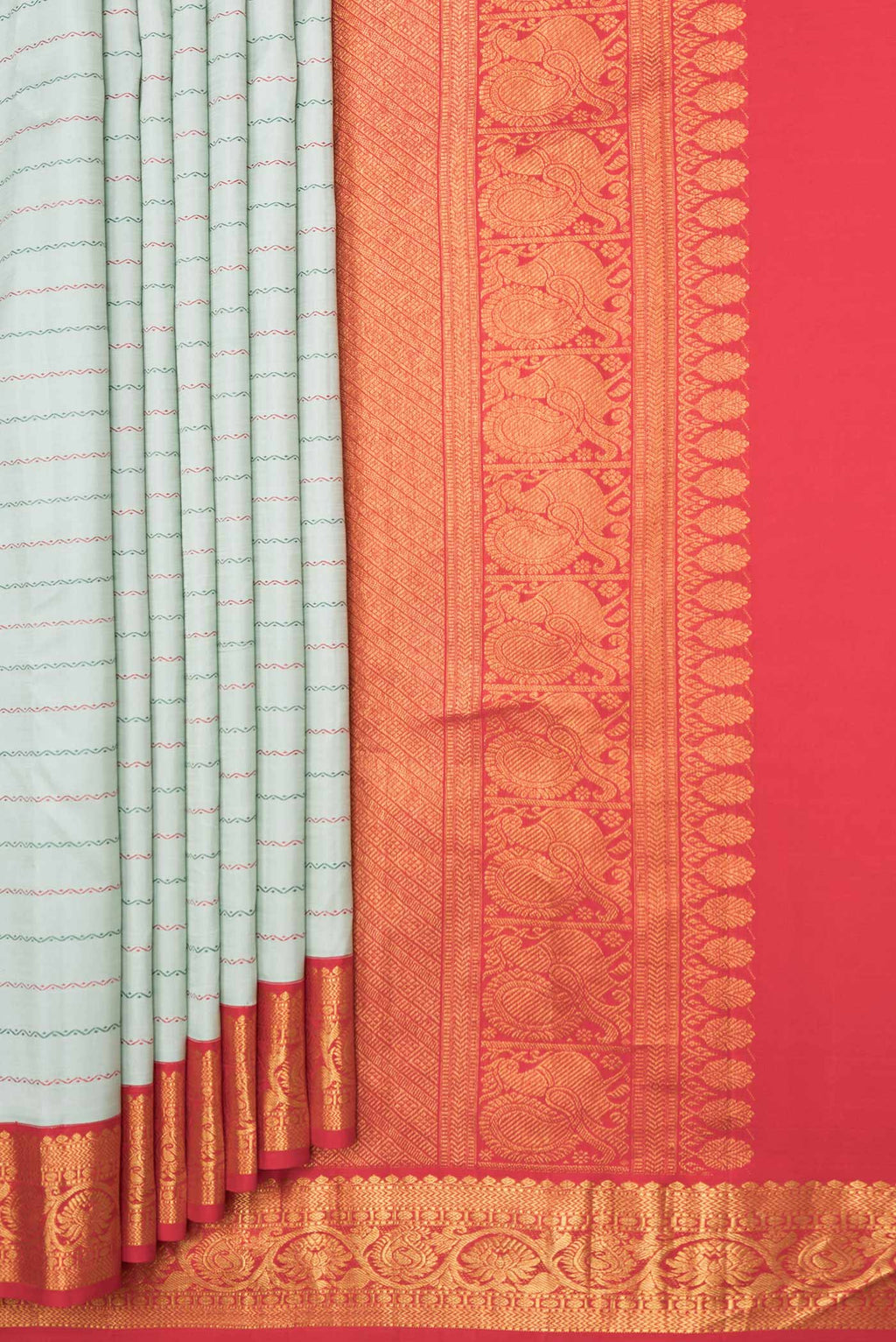 Pleats and pallu of Light Blue Kanchipuram Silk Saree with Veldhari on the body and Ganga Jamuna Border